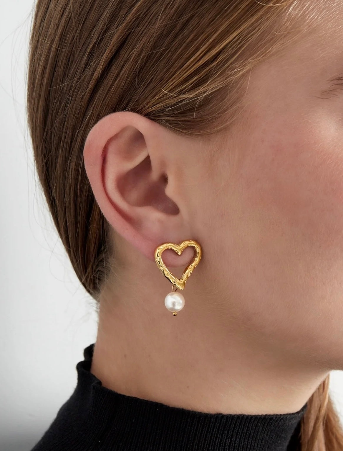 Heart & Pearl - Hartvormige oorbellen met parel