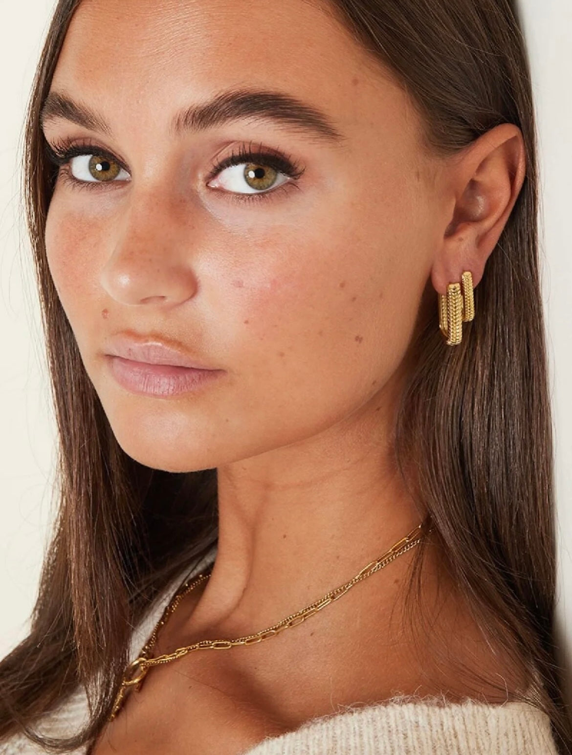 Golden curve - Ovale oorbellen met patroon