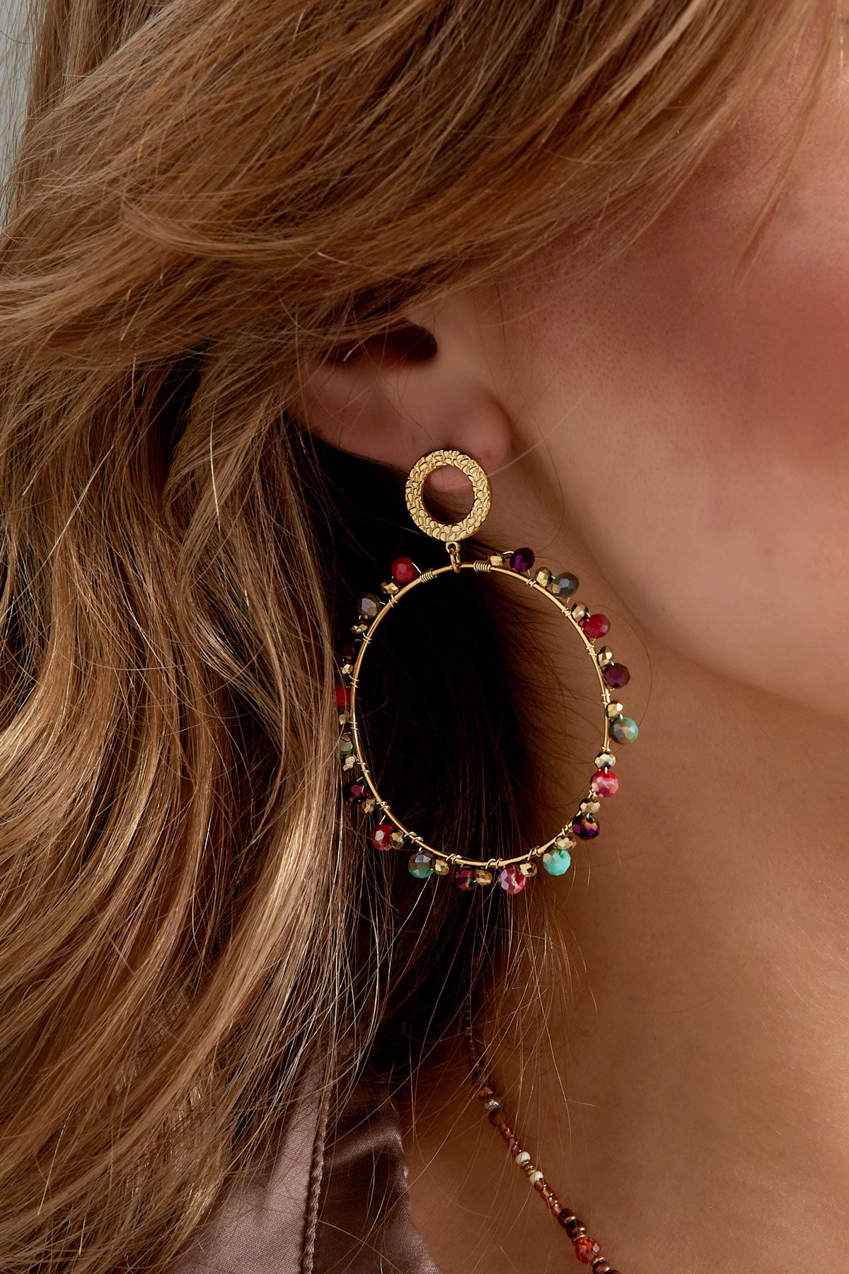 Statement oorbellen met kraaltjes