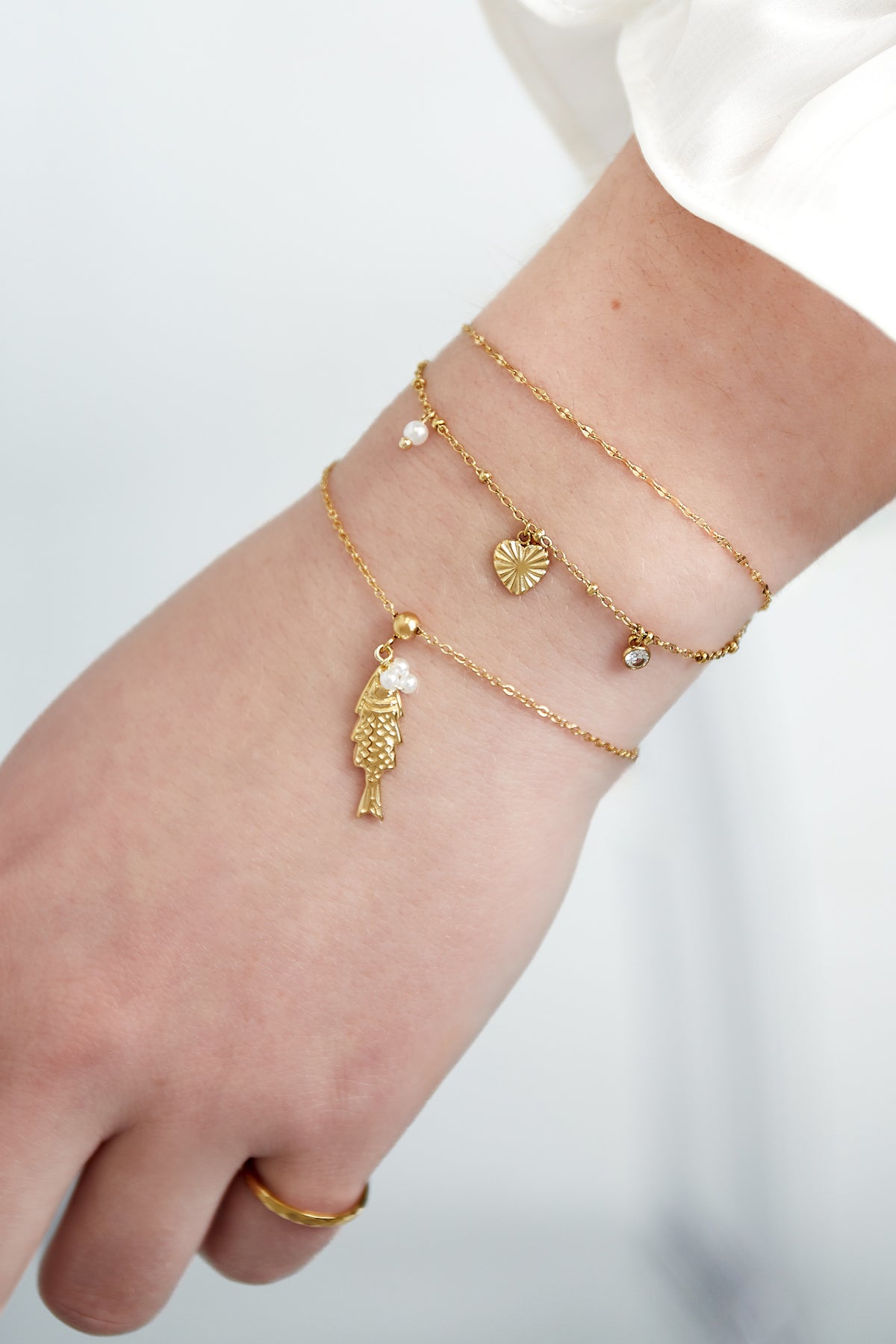 Armband met hartje en steentje