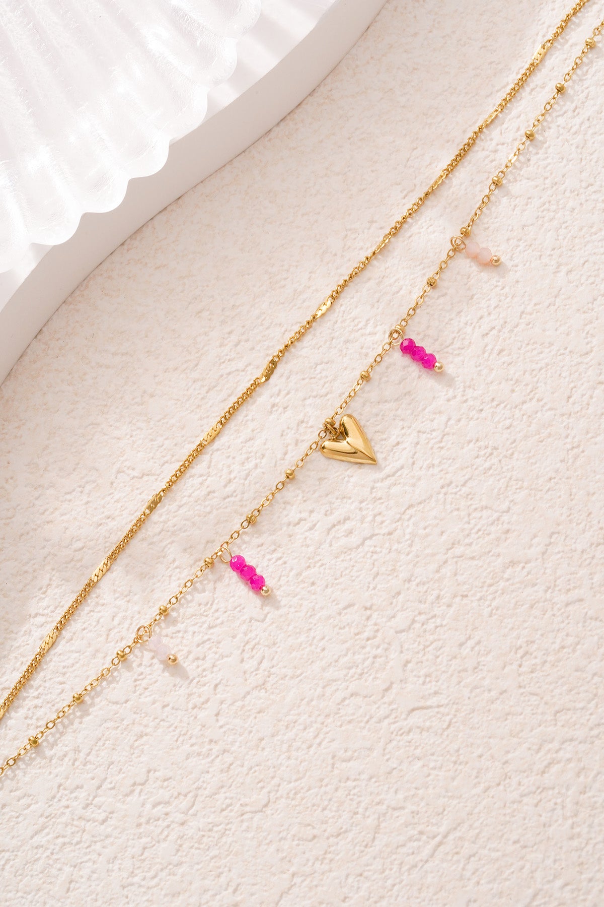 Armband met hart en roze kraaltjes