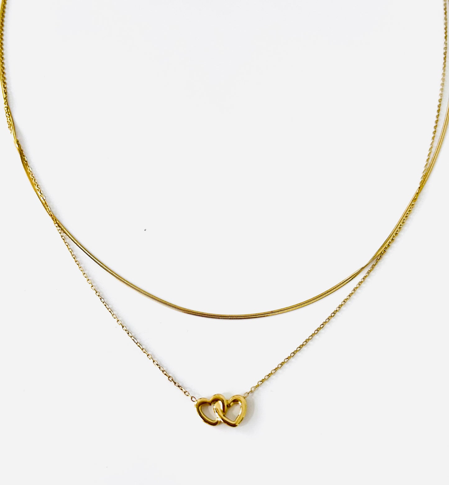 Gelaagde ketting met verbonden hartjes